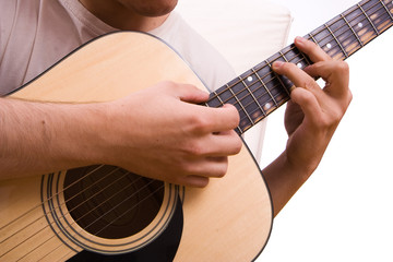 Young man playing a guitar