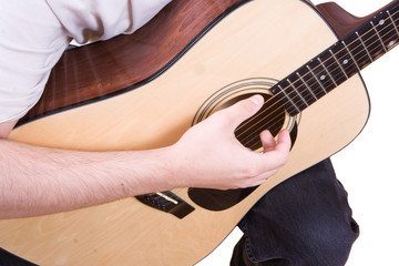Young man playing a guitar