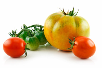 Bunch of Ripe Yellow, Red and Green Tomatoes Isolated on White