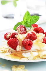 Pancakes with curd cheese and raspberries