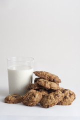 yummy cookies and glass of milk