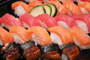 rolls of various sushi on a plate