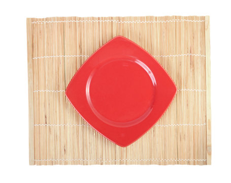 Empty White dishes and wooden chopsticks