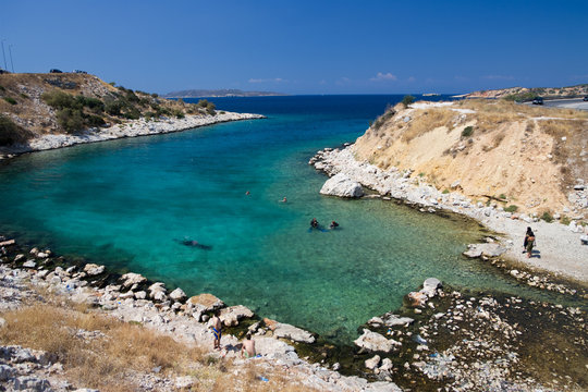 bathers to the sea