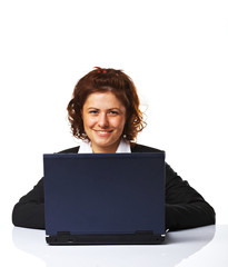 Portrait of a business woman working on a laptop