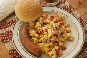 scrambled eggs with organic tomato, sausage and bacon