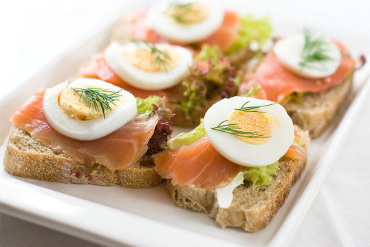 Canapes with smoked salmon and eggs