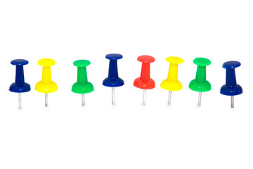 A colorful pile of drawing pins on white