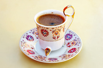 Cup of coffee in a decorative cup