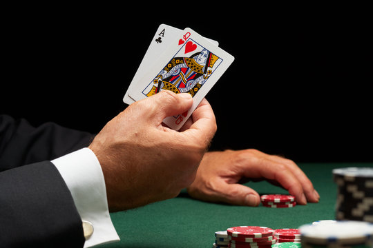 Blackjack hand of cards and casino chips