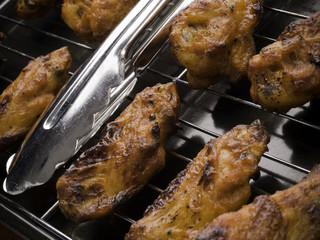 chicken wings on a grill