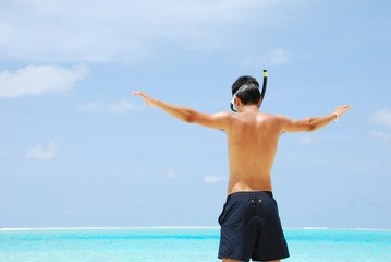 Young man ready to go snorkeling (wide open arms)