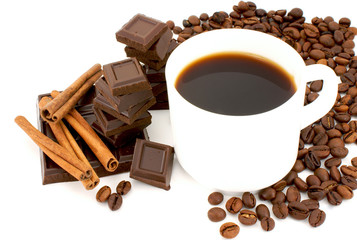 White cup filled with coffee beans