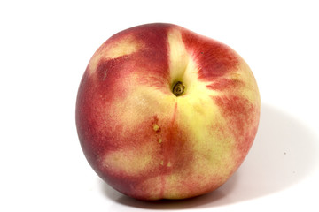 single peach in close up