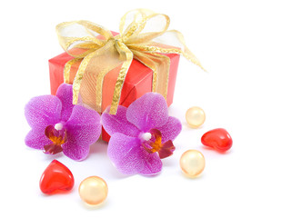 gift box with ribbons and orchid