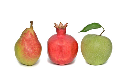 apple, pomegranate, and pear isolated on white background