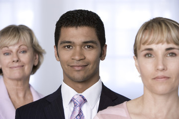 Portrait of businessman and his team.