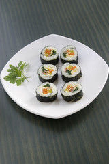 Korean sushi and a parsley leaf.