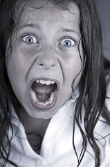 Close Up Shot of a Child Screaming