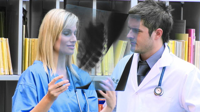 Doctors examining an x-ray in hospital