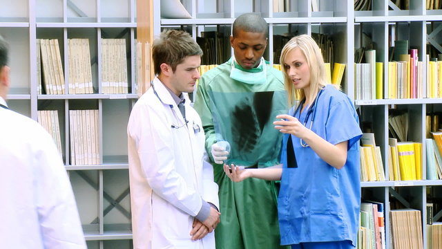 Doctors examining an x-ray in hospital