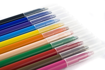 Colorful felt-tip pens (markers) over white