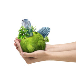Human hands holding green planet with urban city - 16824140