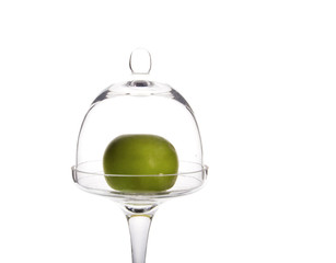 green apple in glass bowl