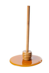 wild honey and wooden dipper isolated