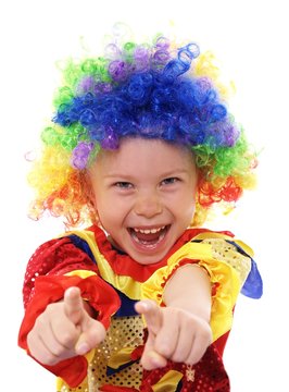 cute little girl in clown costume laughing