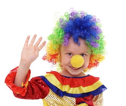 cute little girl in clown costume waving