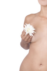 Obraz na płótnie Canvas female body with flower, towel and copy space in white
