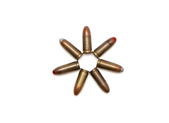 Seven-pointed star of 9mm Parabellum cartridges isolated