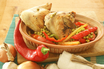 grilled chicken with organic vegetables in a brown bowl