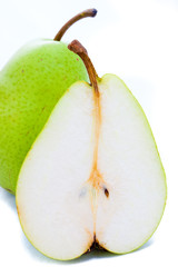 Green sliced pear isolated on white