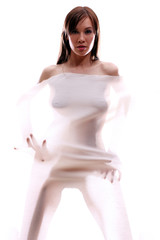 Anonymous nude of girl silhouetted behind sheer cloth .