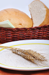 Natural bread, two pieces in basket, wheat, flour