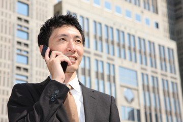 Businessman talks with a cellular phone