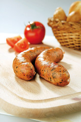 Two sausages with vegetable