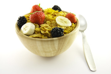 Cornflakes and Fruit in a Wooden Bowl with Spoon