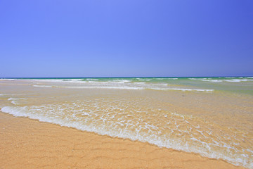 Sandy beach at Faro, Portugal