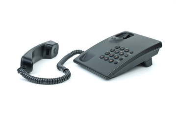 Black office phone with handset near