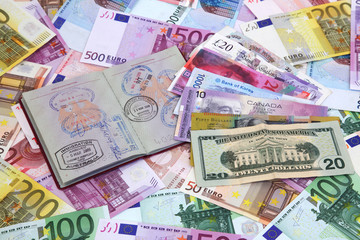 Fototapeta na wymiar Travel Passport on Money Background