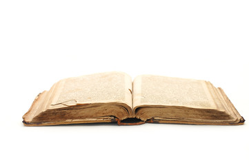 Old open book isolated on white