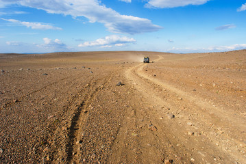 4x4 driving in a deserted landscape in Iceland