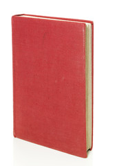 Old red book isolated on white with clipping path.