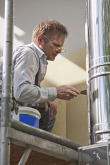 worker on scaffold