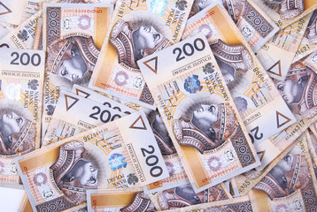 background made of polish 200 zloty banknotes