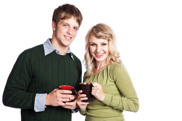 Caucasian couple holding coffee cups