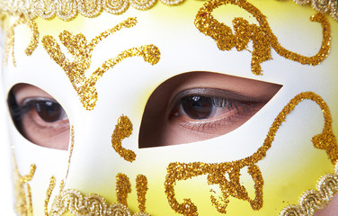 woman with carnival mask on her face